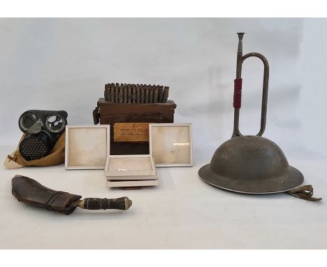 Gurkha Kukri, bugle, Brodie Helmet, gas mask in canvas bag, ammunition box with used 303 bullets (1 box)&nbsp;Condition Repor