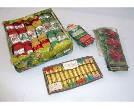 A quantity of vintage Christmas crackers and ribbon&nbsp;