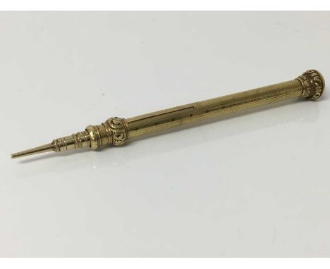 Antique yellow metal Sampson Mordan propelling pencil, the detachable top with inset bloodstone panel, engine turned and foli