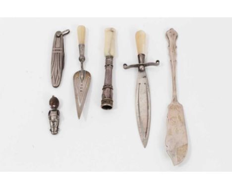 Two Edwardian silver and mother of pearl trowel and sword book marks and other silver novelty items (7)