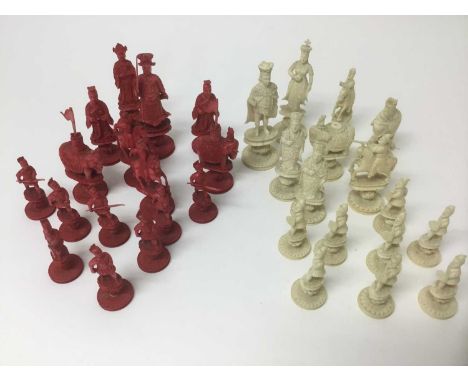 Fine 19th century carved and red stained ivory chess set, the king 9cm high, 32 pieces but some small elements missing 