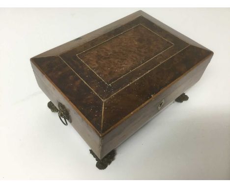 Rare George IV Burr yew jewellery box, of sarcophagus form with flanking drop handles, fitted tray interior raised on brass b