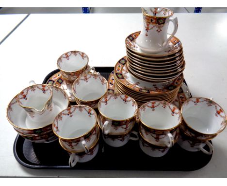 A tray containing a 41 piece antique English china tea service  