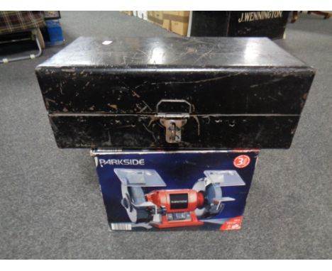 A metal storage box together with a Parkside bench grinder in box 