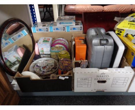 Two crates of miscellany to include wall plates, tins, vintage mobile phone, kitchen scales, two mirrors, cased Black &amp; D