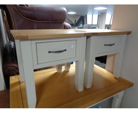 A pair of contemporary oak topped lamp tables fitted a drawer on painted bases 