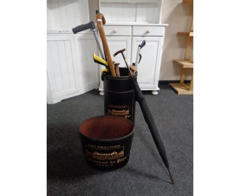 A stitched leather French Chateauneuf du Pape stick stand and bin containing assorted walking sticks, parasol, grabbers, etc 