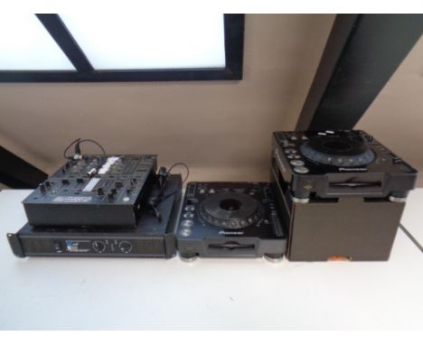 Two Pioneer DJ's compact disc player CDJ-1000 together with a W Audio Pro Power amplifier and a Pioneer DJM-600 DJ mixer, tog