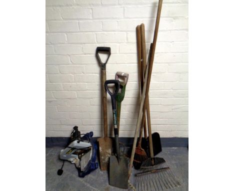A set of aluminium 3 in 1 ladders together with a bundle of garden tools and a mitre saw 