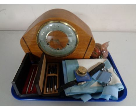 A tray containing miscellaneous to include glass paperweight, Smiths mantel clock, cased pens by Parker, Freemason's apron, c