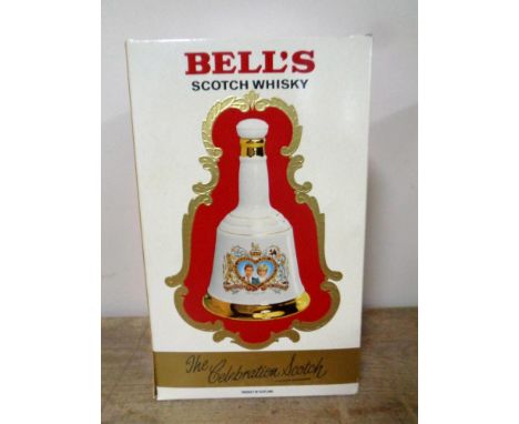 A Bell's Scotch Whisky decanter by Wade to commemorate The Wedding of H. R. H. Prince Charles to Lady Diana Spencer 1981, 75c