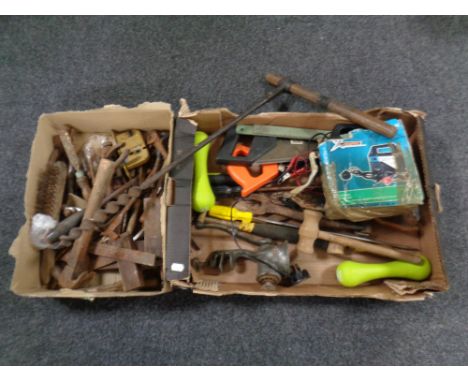 Two boxes of vintage hand tools, battery charger, hand axe etc 