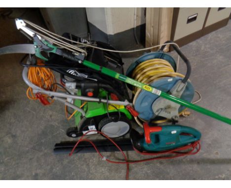 A Florabest electric garden airator, together with a Bosch electric hedge trimmer, a hosepipe on reel and a telescopic tree l