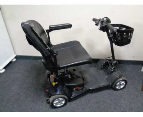 A Pride Apex light mobility cart with battery and charger 