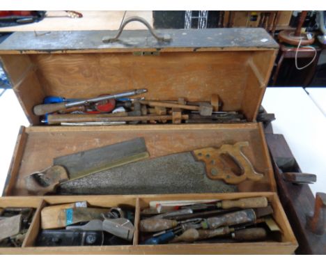 A vintage joiner's toolbox containing a large quantity of woodworking tools to include planes, hand saws, chisels, finger pla
