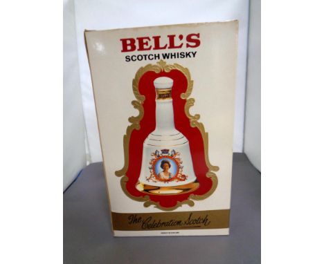 A Bells Scotch whisky decanter to commemorate the 60th birthday of Queen Elizabeth II, 75cl, in original box. 