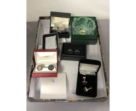 Four cased cuff link sets together with a lighter and crystal ashtray and a First Born blanket and teddy gift set, boxed. 