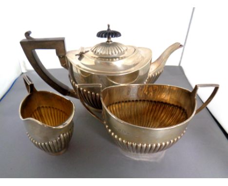 A three piece silver tea service, Birmingham 1904 CONDITION REPORT: 615g gross. 