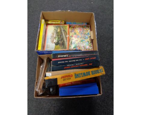 Two boxes containing vintage games and jigsaws to include Wells Fargo, The Third Man, Laramie, Indoor Bowling etc   