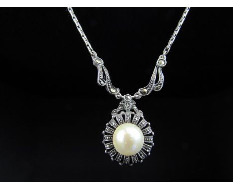 Vintage 1940's Foreign silver (poss french 935)Marcasite and Mabe pearl neck-let. The flower head pendant drop is approx 16.2