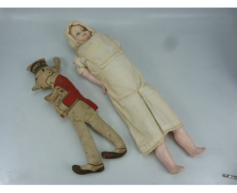 Victorian part bisque limbed doll with fabric body along with a sunny Jim doll