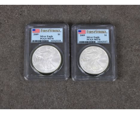 Two x 2009 Silver Eagle (first strike) $1 coins both MS 70, certificate numbers 14163115 &amp; 14163117. (2)