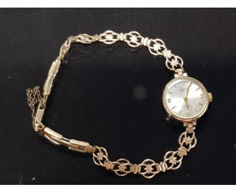 VINTAGE LADIES 1964 AVIA WATCH WITH SOLID 9CT GOLD CASE AND 12CT ROLLED GOLD STRAP IN GOOD WORKING ORDER 12.3G GROSS
