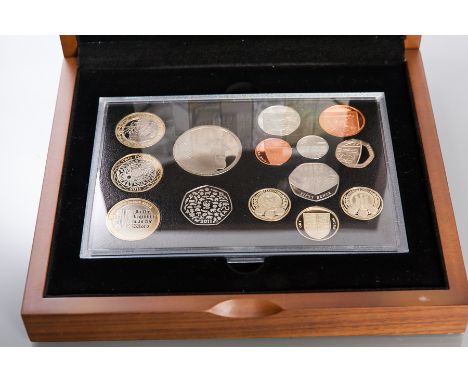 THREE ROYAL MINT EXECUTIVE PROOF SETS 
dated 2009, 2010 and 2011; together with a Diamond Wedding Photographic Portrait part 