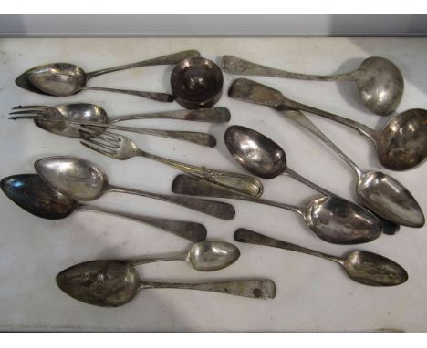 A collection of silver cutlery including Georgian sauce ladle, various makers 497g