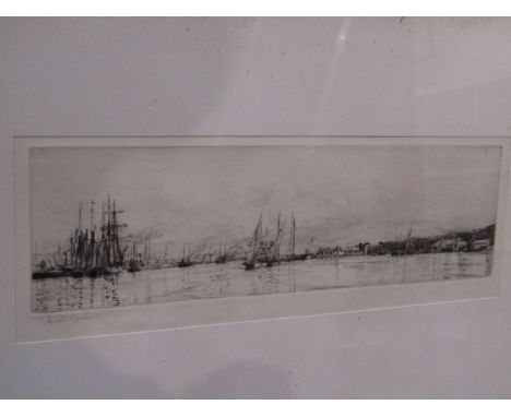 HAROLD WYLLIE (1880-1973): An etching depicting tall ships and sailing vessels in harbour, 10.5cm x 31.5cm, framed and glazed