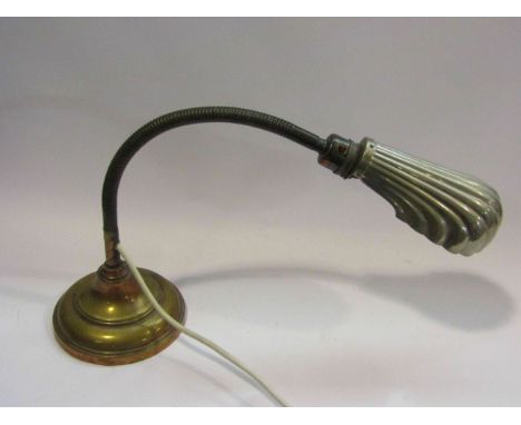 A late 19th/ early 20th Century desk lamp with shell form shade, 62cm tall