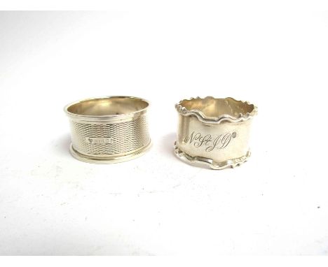 Two silver napkin rings both monogrammed one by William Hutton &amp; Sons, Sheffield 1929, the other by C.J. Vander, Birmingh