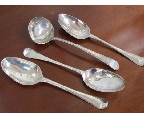Three George II silver spoons with crested and monogrammed handles dated 1741, 1749 &amp; 1747, dents present and a George IV