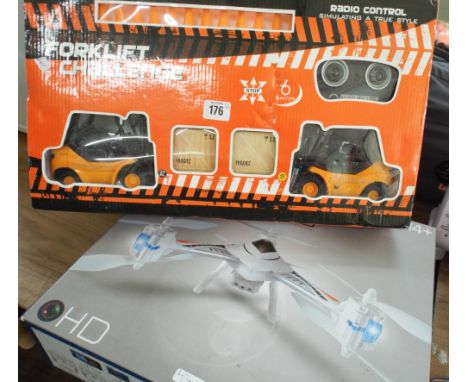 A remote control quad copter and remote control fork lifts