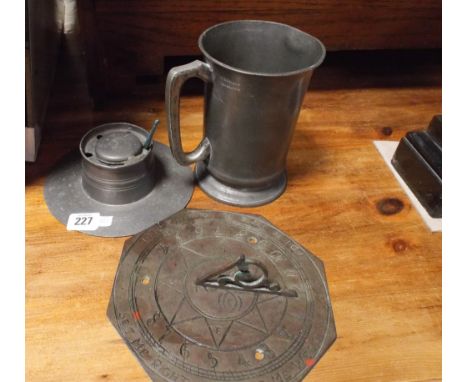 Pewter ink stand, tankard and a brass sundial 