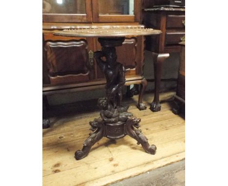 19th century circular oak centre table on pillar and tripod base carved with knights fighting and dragons - top 2' diameter  