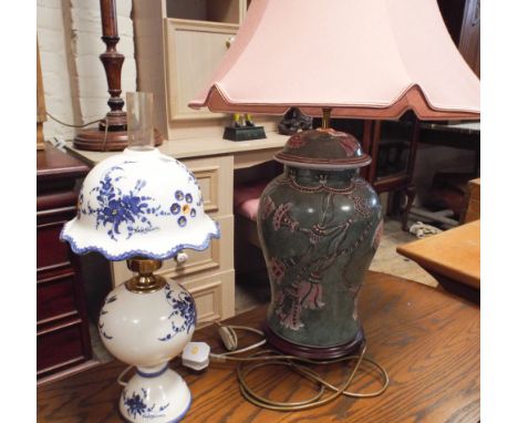 Large Oriental green and decorated china table lamp with shade and a blue and white oil lamp style electric lamp 