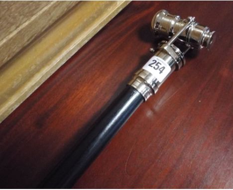 Ebonised walking stick with plated telescope handle 