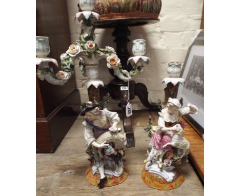 Meissen style candleabra and a figure candlestick , as found