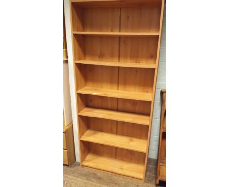 Pair of 2'6 light pine effect open bookcases 