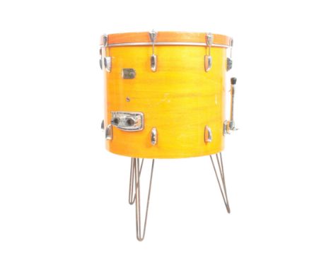 A contemporary Pearl Protone drum having been converted into a lamp / side table. The drum now being raised on hairpin suppor