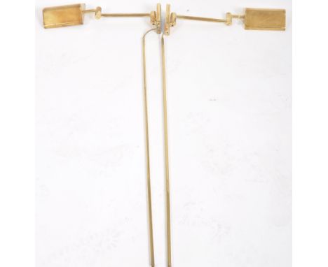 A pair of vintage 1980s Hollywood Regency brass wall mounted articulated reading lamp lights. Each with adjustable brass shad