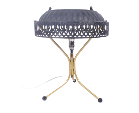 Inverse cast iron lampshade being a repurposed early 20th century centrepiece mounted upon gold chrome tripod with bulb fixtu