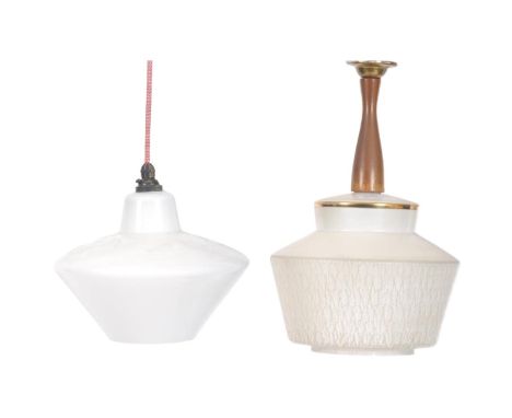 An assortment of two retro vintage mid 20th century opaline glass ceiling light shades. The lot to include a white opaline ta