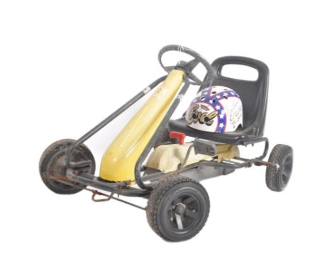 Kettler - An early 2000 children pedal car / go cart of typical form with single formed plastic bucket seat and four wheels. 