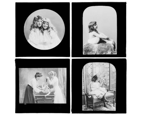 *Magic Lantern Slides. A group of 59 diapositive photographic lantern slides of child studies, early 20th century,  some colo
