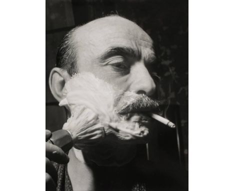 *Fontana (Lucio, 1899-1968). Lucio Fontana shaving without cutting, circa 1965,  vintage gelatin silver print by an unknown p