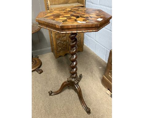 A Victorian mixed rosewood and other tropical hard and burr woods decorated octagonal top table set with a geometric type des