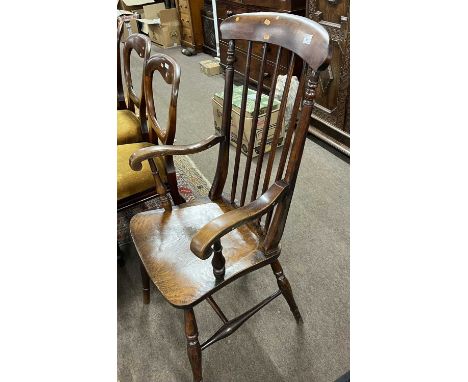 A Victorian elm seated stick back Windsor chair with turned legs and H formed stretcher (Item 73 on vendor list)