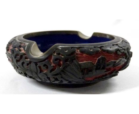 An enamel cinnabar lacquer type ashtray, 10cm diameter